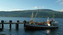 Rybárska loďka v malom prístave Gronneset na brehu Fannefjordu, odkiaľ v minulosti premával trajekt spájajúci polostrov Skaly s mestom Molde